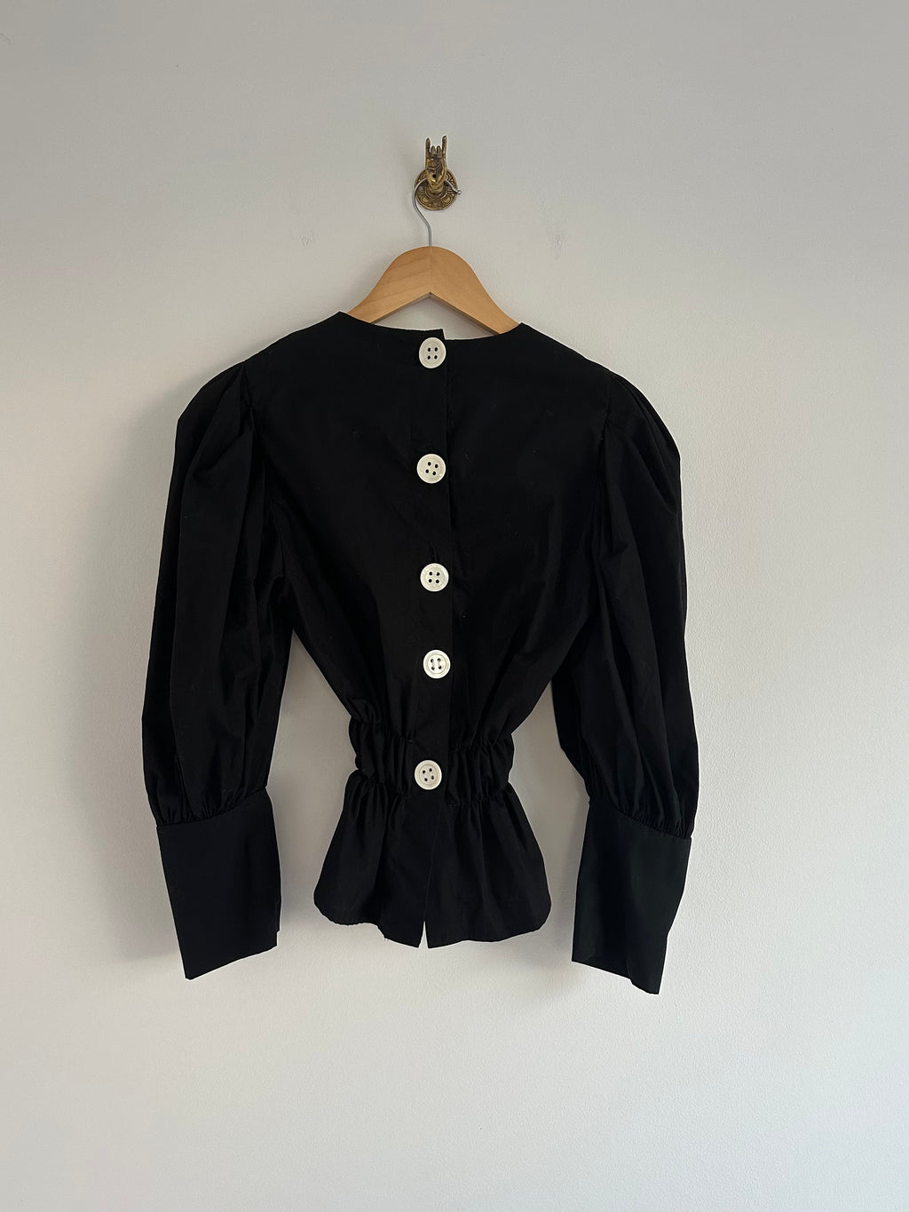 Zwarte blouse elastiek