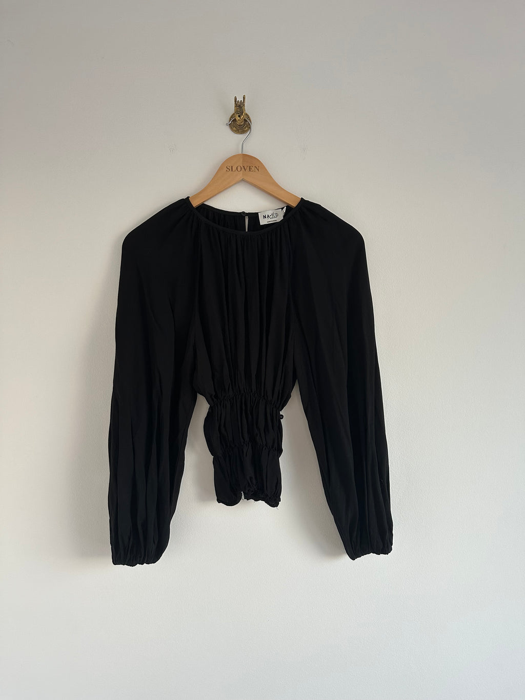 Zwarte blouse elastiek